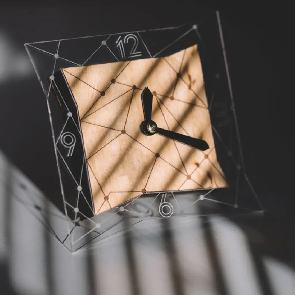 A customized wall clock featuring a unique design with a company logo and personalized details, combining functionality and branding.