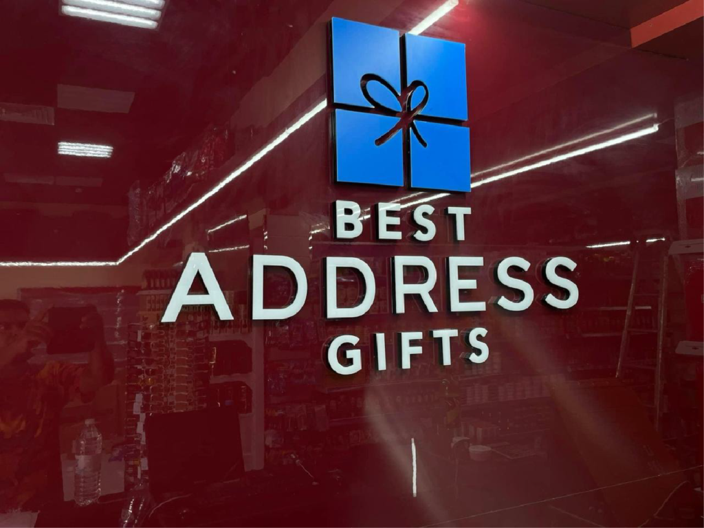 An indoor and outdoor signage display for a two-star gift shop, featuring charming designs and vibrant colors. The signs are strategically positioned to attract customers and promote the unique offerings of the shop.